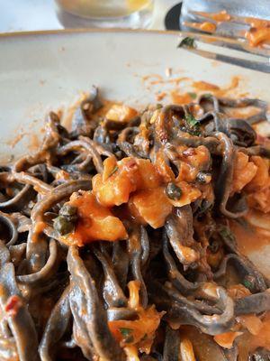 Tagliolini Al Nero.  I was being beckoned by my dish to eat, so I did. It could have used a bit more heat (spice) but still very yummy!