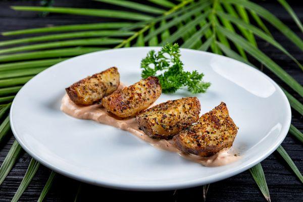 Heavenly herb crusted and seasoned Yukon Gold potato wedges. Accompanied by MTV special house sauce for your dipping pleasure!