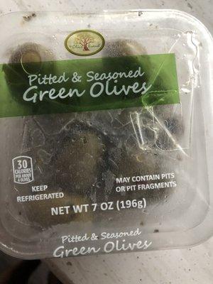 Delicious seasoned green olives.