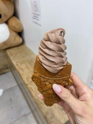 Plain chocolate soft serve in fish cone (custard filling)