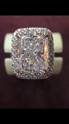 GIA Certified 9.02 Carat. F Color SI1 Clarity. Platinum Halo Setting.