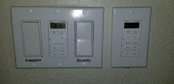 Timmer switches to turn outside lights on and off, easy to program.