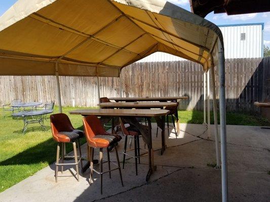 The smoking section has shade on the hot days.