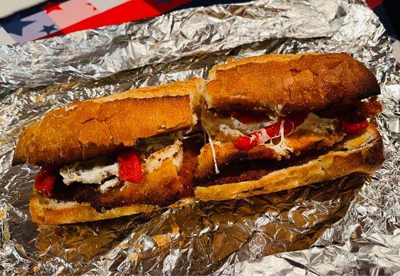 Breaded Chicken cutlet sandwich with fresh mozzarella and roasted peppers. A little short on the peppers but still very good