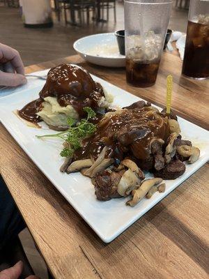 Beef tips and gravy with mashed potatoes