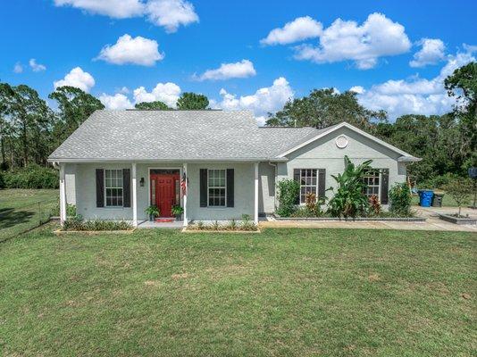 1107 Redbird St Lake Placid, FL 3/2/2 on almost an acre $325,000