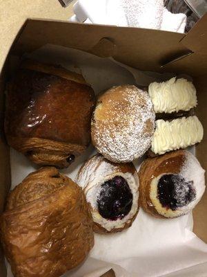 Carrot cake, berry danishes and chocolate croissants.