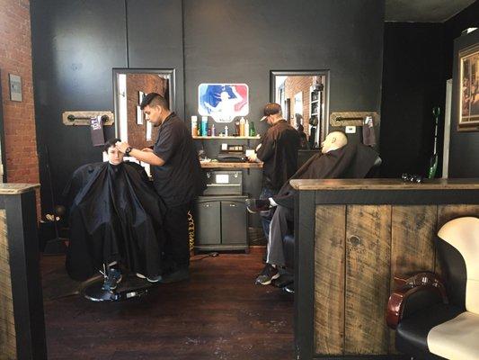 Barbers at work.