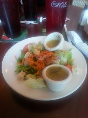 House salad with orange vinaigrette dressing.