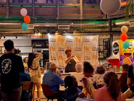 Chef Aaoron May showing us how he made his Bottle Rockets dish