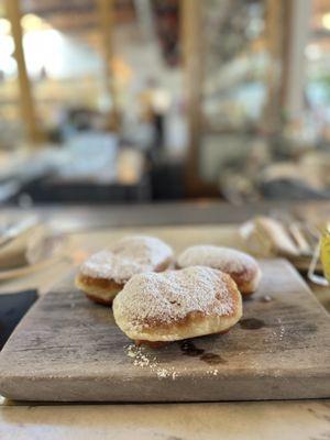 Beignets with powdered sugar.