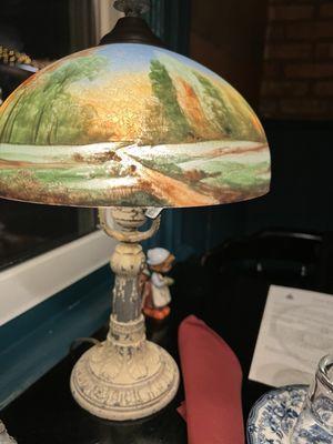 The beautiful reverse hand painted cast iron lamp on my table!