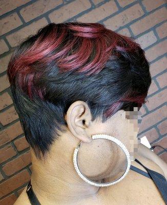 Custom hair-topper blended with natural hair in back.