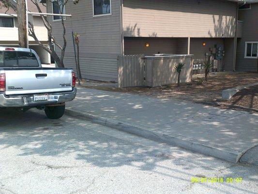 Plenty of room behind the vehicle to move the bin out.