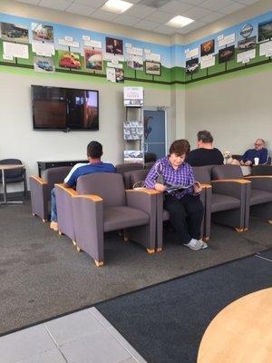 Service waiting area with large screen TV