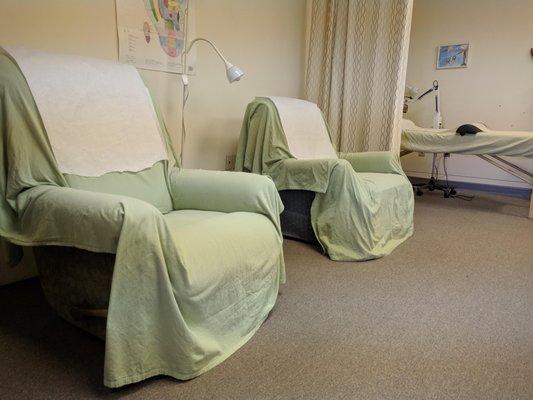 treatment rooms, we have recliner chairs and massage tables for different treatment options