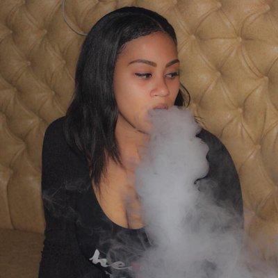 Smoking hookah at Cleopatra Hookah Lounge