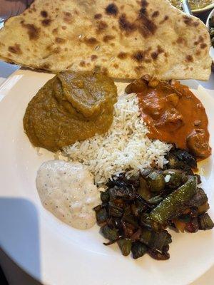 Eggplant curry, mushrooms in tikka masala sauce, okra, rice, yogurt sauce and plain naan