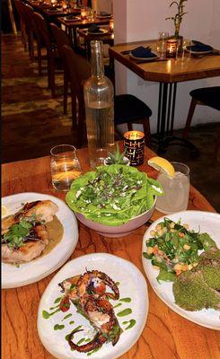 Table Spread of Octopus, Lamb Chops and Slow-Roasted Chicken