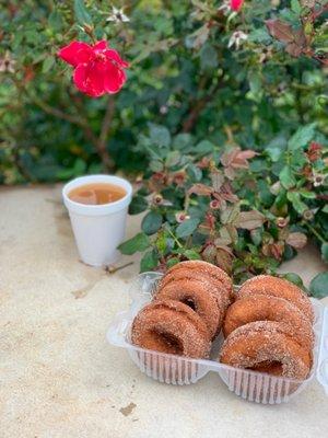 Half-dozen apple cider donuts and hot apple cider