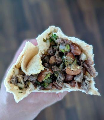 Carne asada, beans, onions, cilantro, salsa, beans..