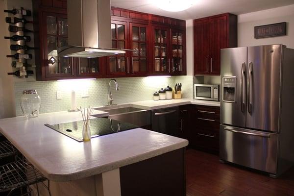 Kitchen Remodel - concrete countertops, glass backsplash, glass cabinets, and more...