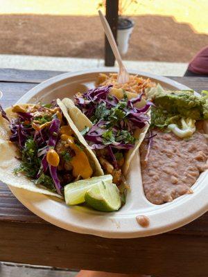 Fish taco plate with rice and beans