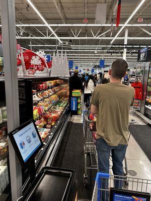 Line all the way to the produce section for the self checkout kiosks.