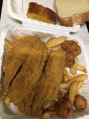 Lunch special- tilapia with fries and hush puppies. Tilapia needed a little more seasoning. For me.