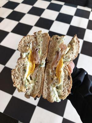 Energy whole wheat bagel with chive cream cheese, egg and lox