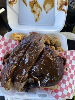 Ribs and chicken plate. Sides are fried okra and Mac n cheese