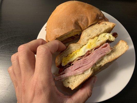 Ultimate Bagel: ham, bacon, egg, and cheese on a plain bagel.