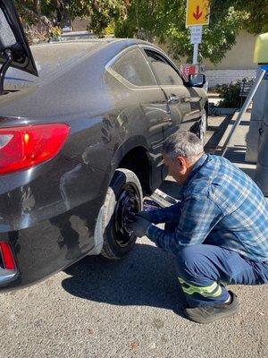 Excuse my v dirty car, but thank you to this gentleman who helped me change to my spare!