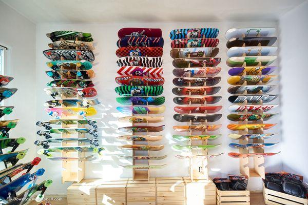 Walls of skateboard decks, old school decks, longboards, and cruisers.