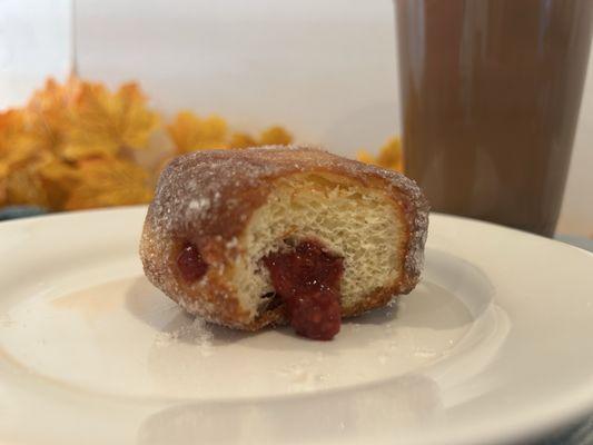 Raspberry jelly filled donut, iced brown sugar skim latte