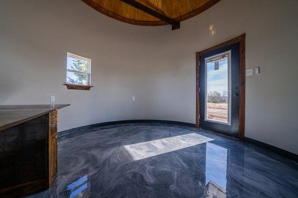 Conversion of a grain silo into a neat and unique home office. It features metallic epoxy flooring and cathedral ceilings as well as HVAC!