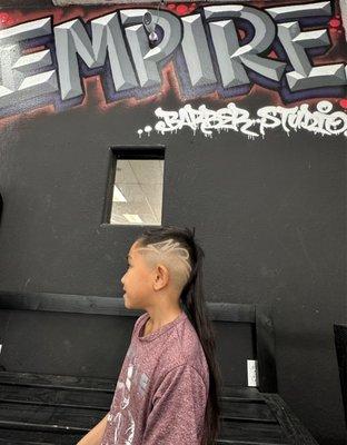 My youngest kid with a design haircut by Eddie.