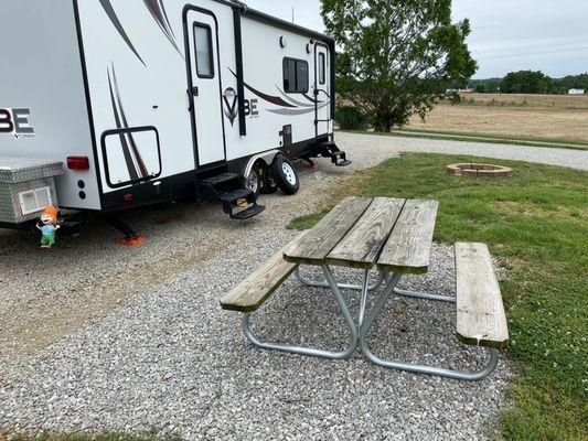 Great campsite size with fire pits and a table!