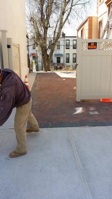 Cement Sidewalk and Nicolock Pavers holland stone installed in the driveway