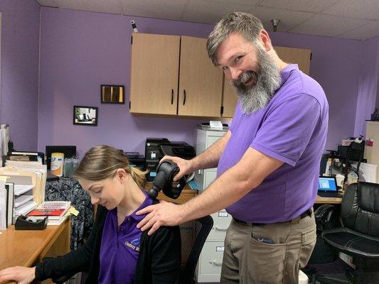 Rob is enjoying showing off his new Hypervolt massage gun with Jessica.