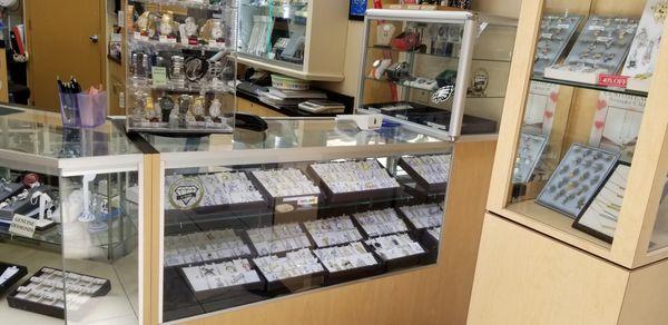 Large display of Sterling silver CZ pendants.