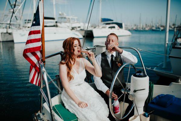 Toasting with champagne on Keith's sailboat.