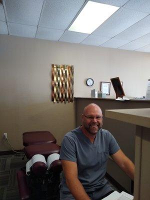 Dr Nick smiling after adjusting his patients for the day!