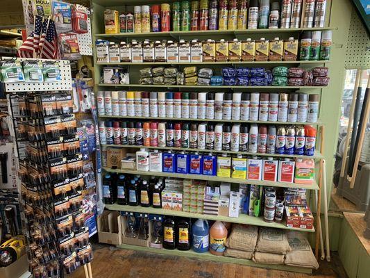 Krylon and Rust-Oleum spray paint along with miscellaneous painting supplies.