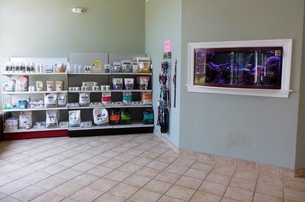 Hickory's retail area - fully stocked with cat and dog treats, specialty foods, shampoos, supplements, and Lupine collars