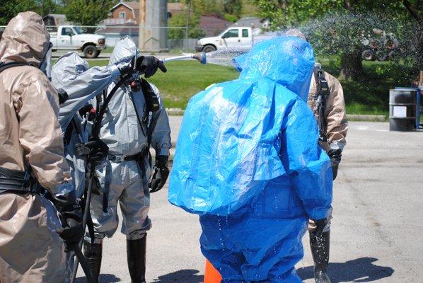 Students learning the important of decontamination after exiting hazardous atmospheres.