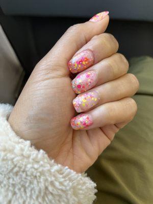 My nails out here looking like candy from one of the dip options available