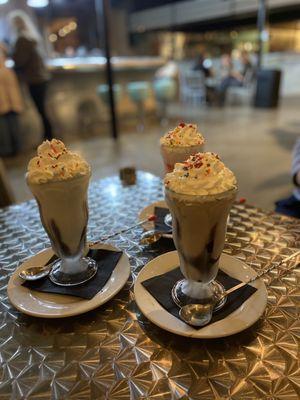 Trifecta of strawberry, vanilla, and chocolate shakes.