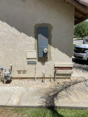 Stucco repair around electrical panel