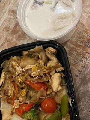 Cup of Tom Kha Gai Soup with drunken noodles